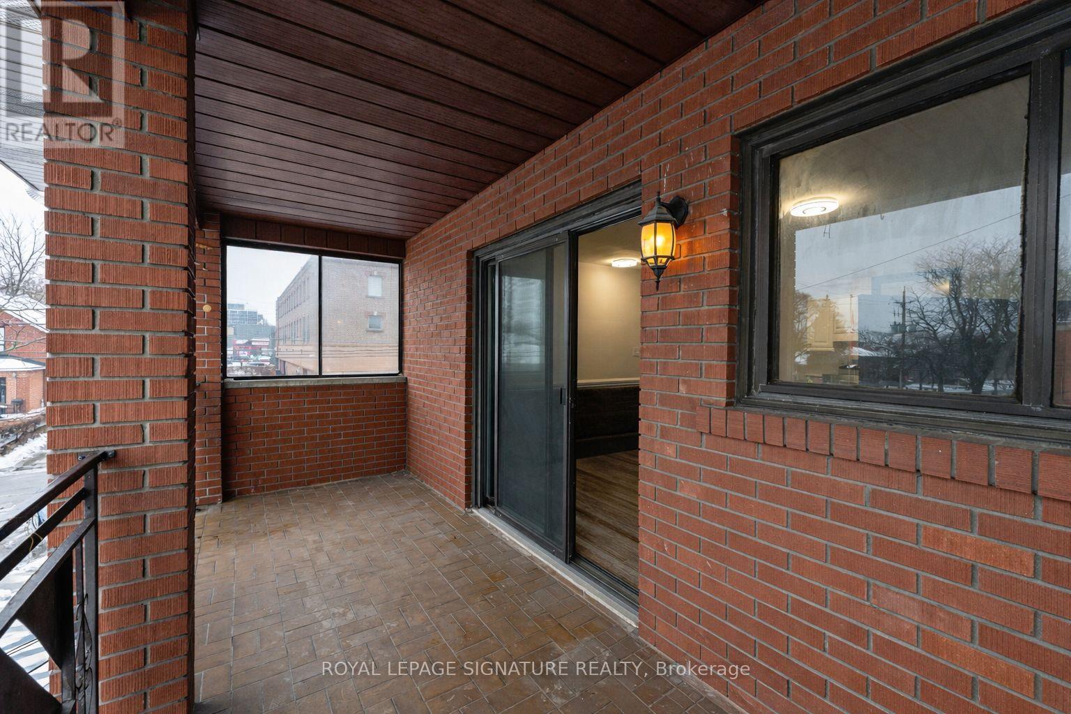 #rear - 713 The Queensway, Toronto, Ontario  M8Y 1L2 - Photo 18 - W12660658