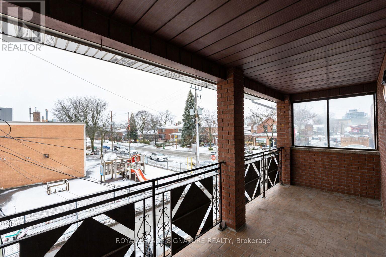 #rear - 713 The Queensway, Toronto, Ontario  M8Y 1L2 - Photo 19 - W12660658