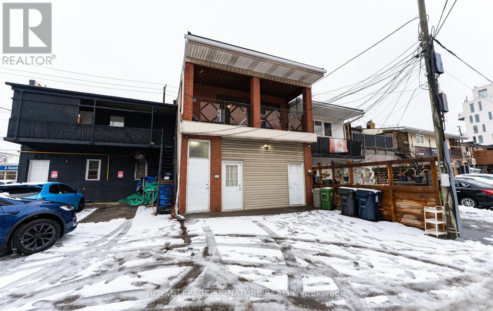 #rear - 713 The Queensway, Toronto, Ontario  M8Y 1L2 - Photo 2 - W12660658