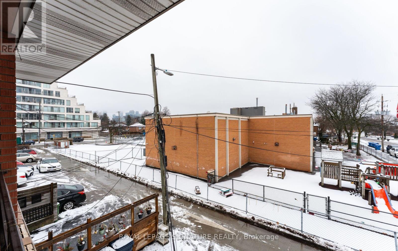 #rear - 713 The Queensway, Toronto, Ontario  M8Y 1L2 - Photo 21 - W12660658