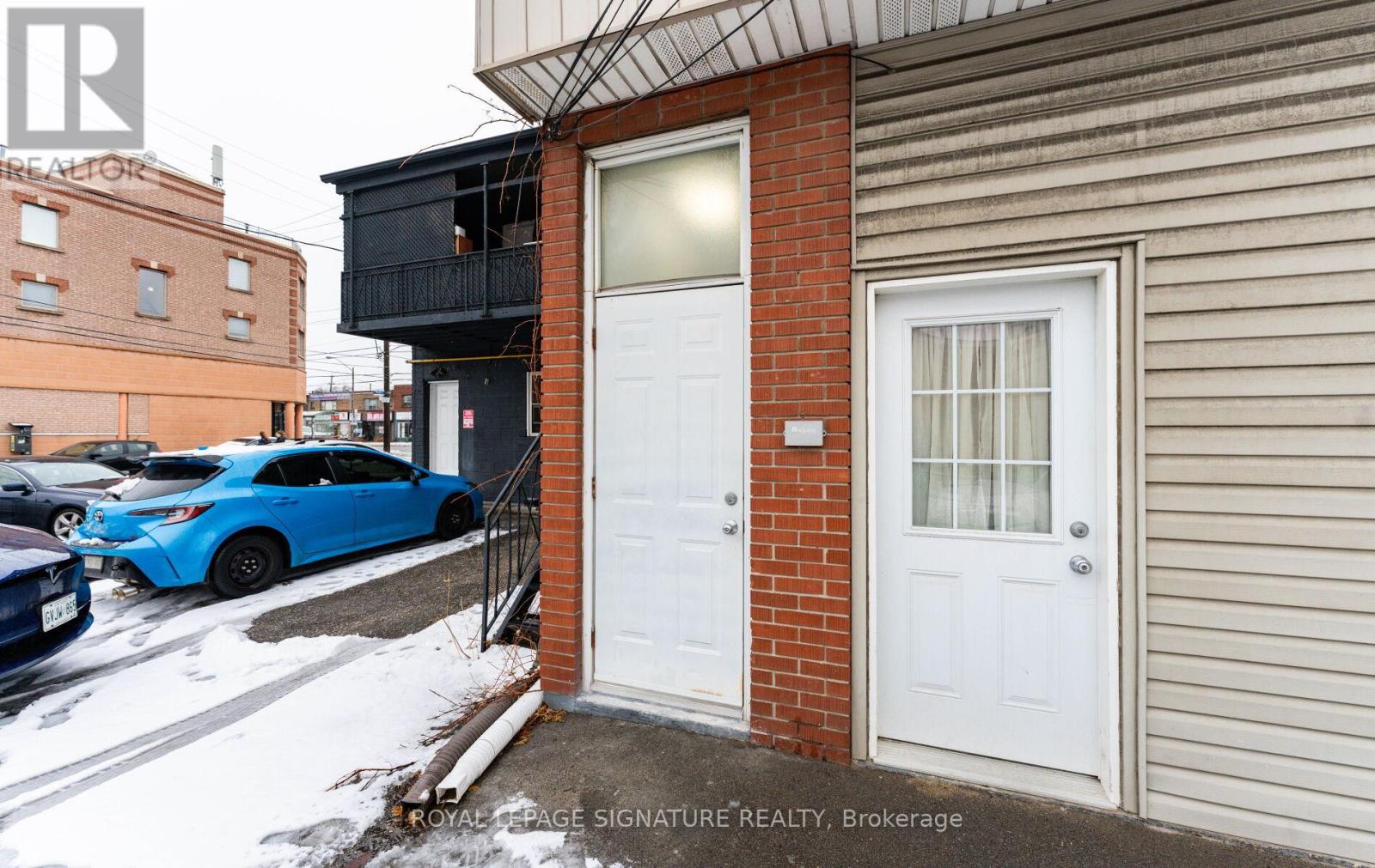 #rear - 713 The Queensway, Toronto, Ontario  M8Y 1L2 - Photo 3 - W12660658