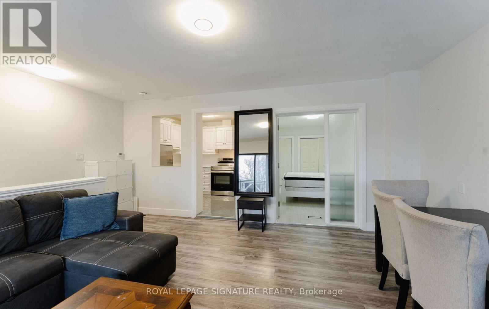 #rear - 713 The Queensway, Toronto, Ontario  M8Y 1L2 - Photo 6 - W12660658