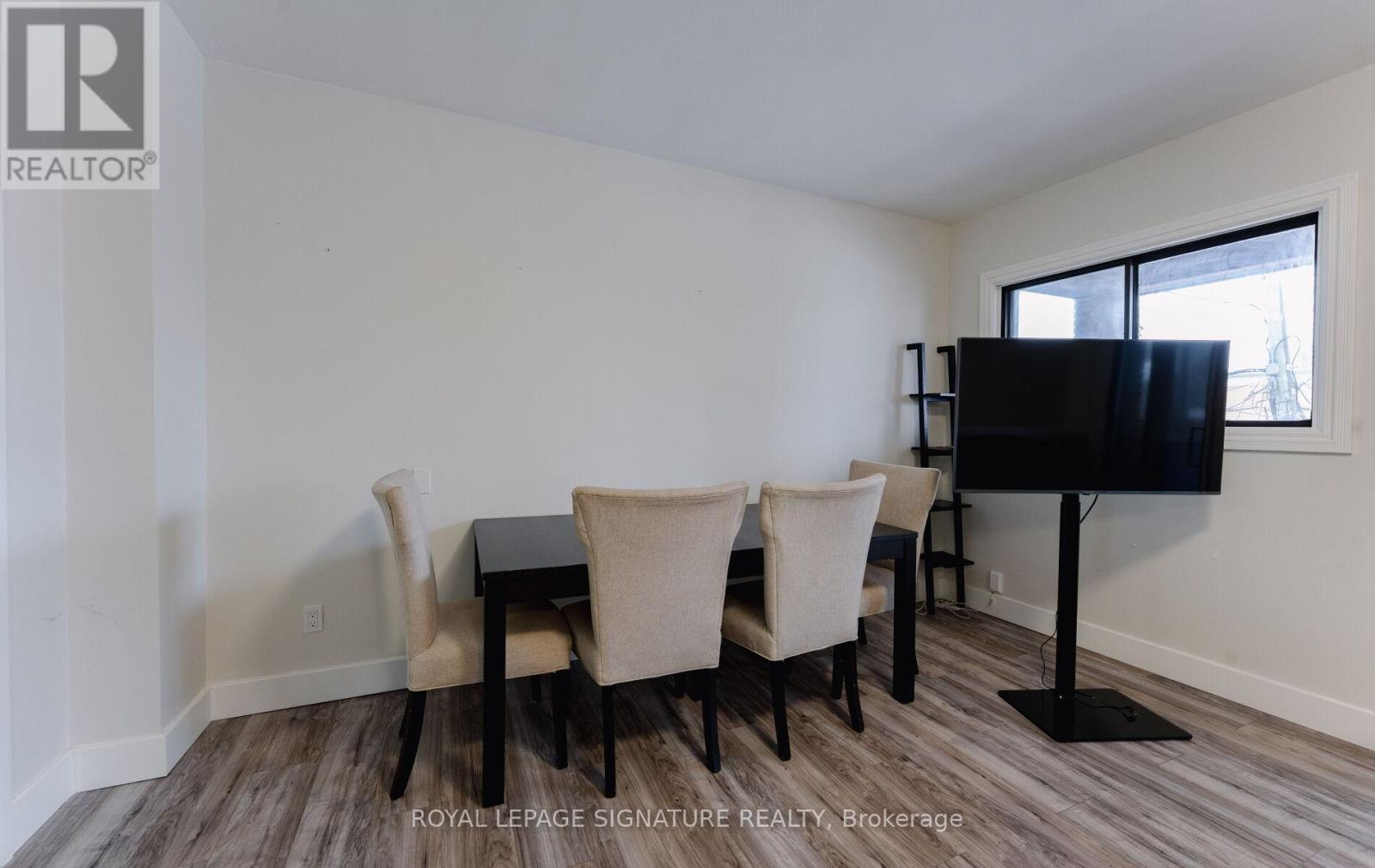 #rear - 713 The Queensway, Toronto, Ontario  M8Y 1L2 - Photo 9 - W12660658