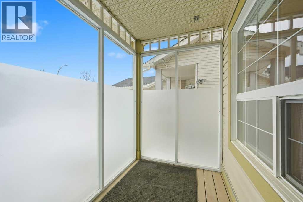 101 Panamount Manor Nw, Calgary, Alberta  T3K 6H7 - Photo 3 - A2276835