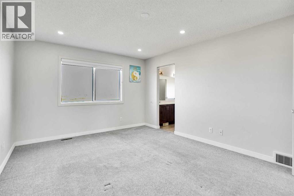 85 Boulder Creek Manor Se, Langdon, Alberta  T0J 1X3 - Photo 30 - A2266885