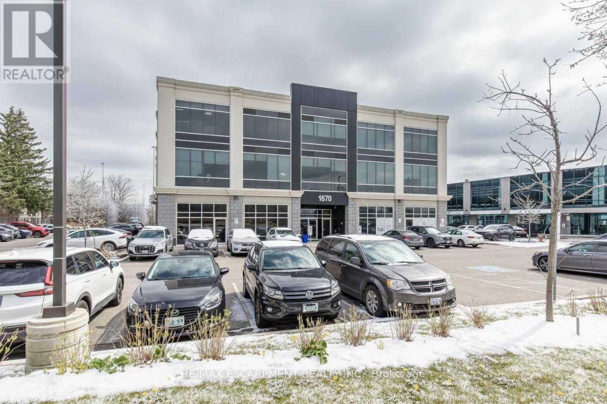 215 - 1670 North Service Road, Oakville, Ontario  L6H 7G3 - Photo 2 - W12661474