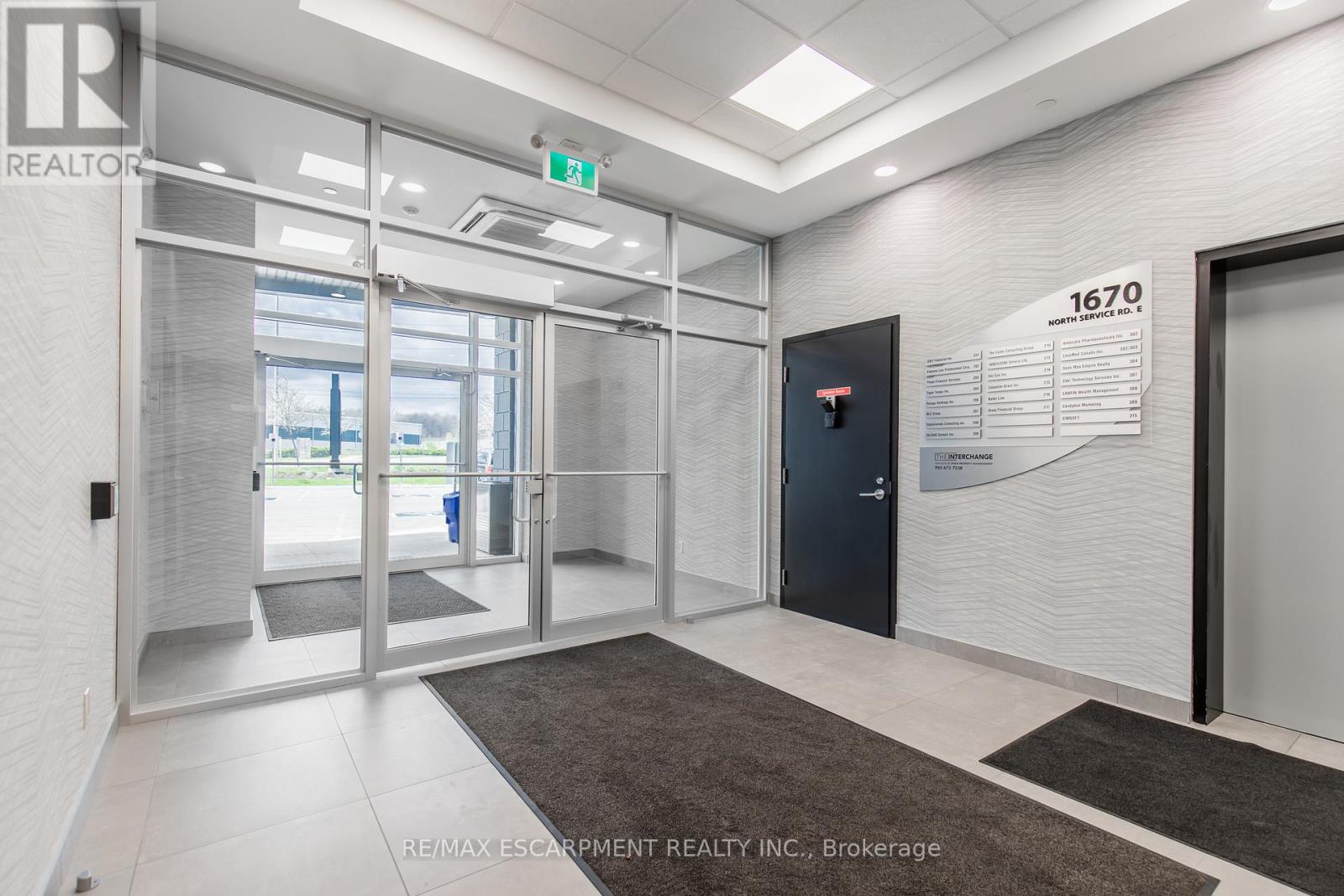 215 - 1670 North Service Road, Oakville, Ontario  L6H 7G3 - Photo 4 - W12661474