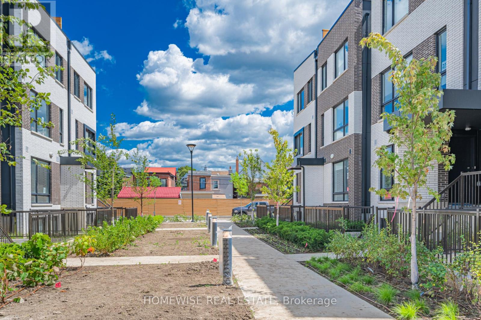 Th8 - 20 Ed Clark Gardens, Toronto, Ontario  M6N 0B5 - Photo 20 - W12662058