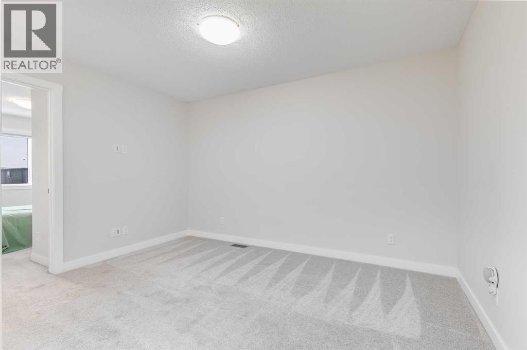 226 Midgrove Mews Sw, Airdrie, Alberta  T4B 5K7 - Photo 11 - A2274679