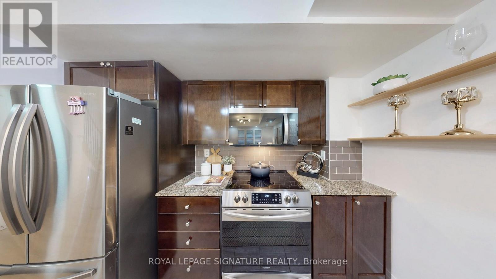 226 - 25 Turntable Crescent, Toronto, Ontario  M6H 4K8 - Photo 6 - W12640418