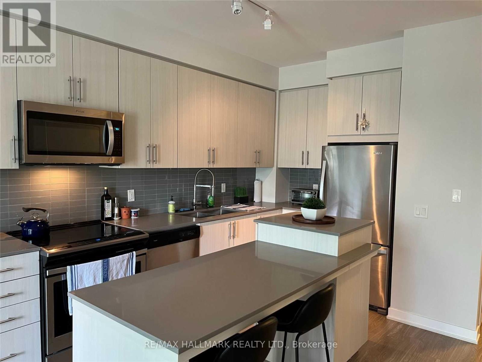 716 - 4055 Parkside Village Drive, Mississauga, Ontario  L5B 0K8 - Photo 3 - W12663474