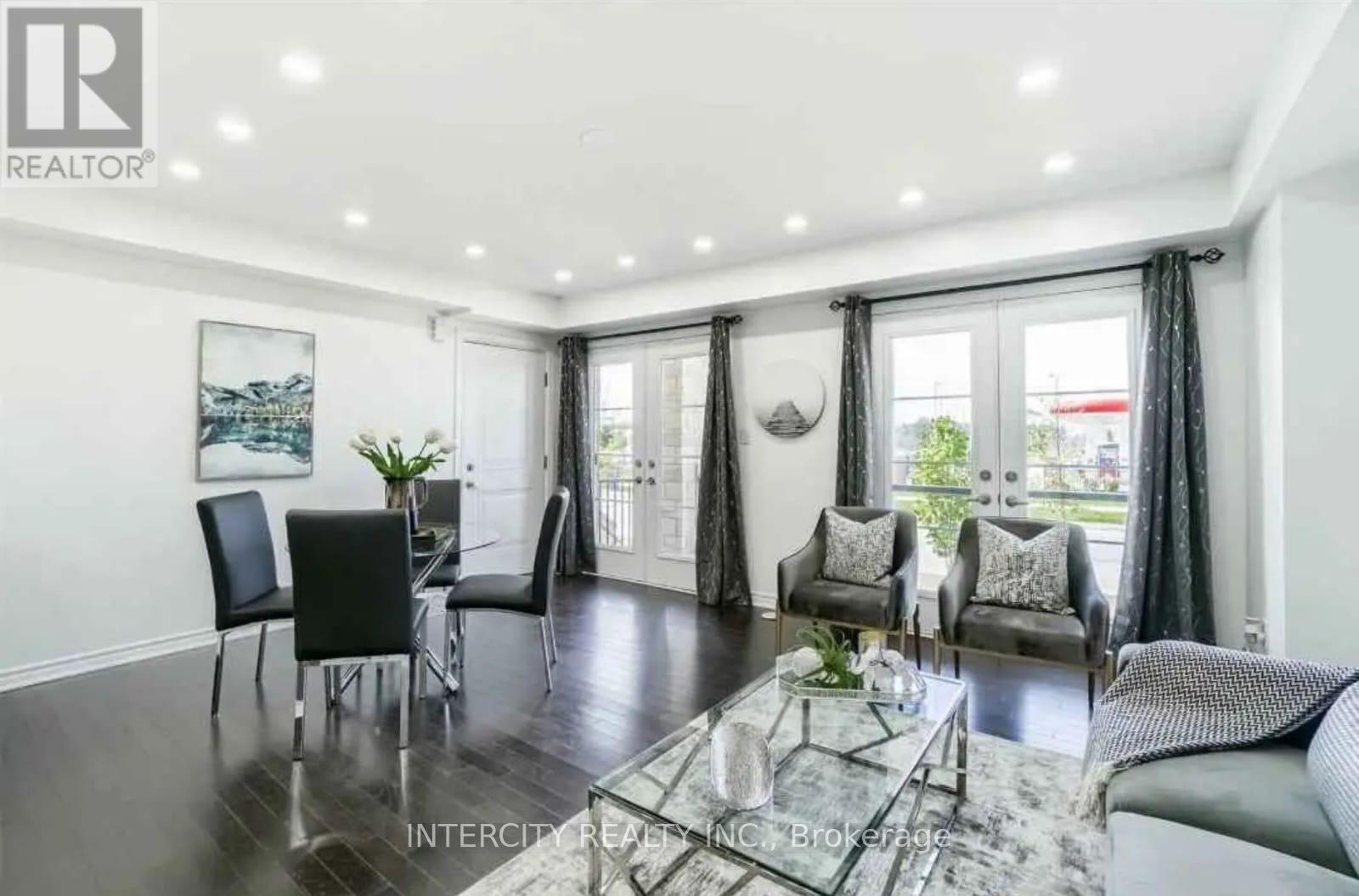 106 - 200 Veterans Drive, Brampton, Ontario  L7A 4S6 - Photo 2 - W12663532