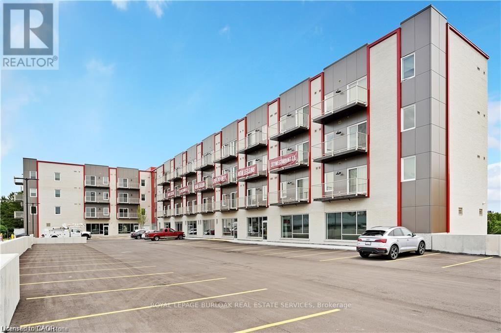 2 - 301 Westmount Road W, Kitchener, Ontario  N2M 0C4 - Photo 1 - X12664006