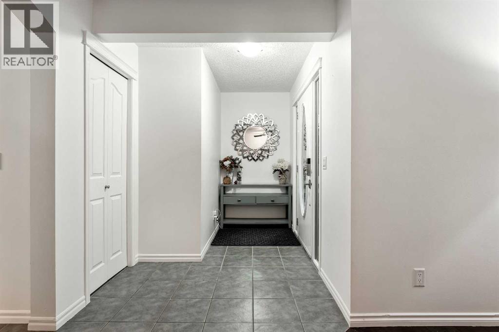 21 Mckinnon Street Nw, Langdon, Alberta  T0J 1X2 - Photo 6 - A2274079