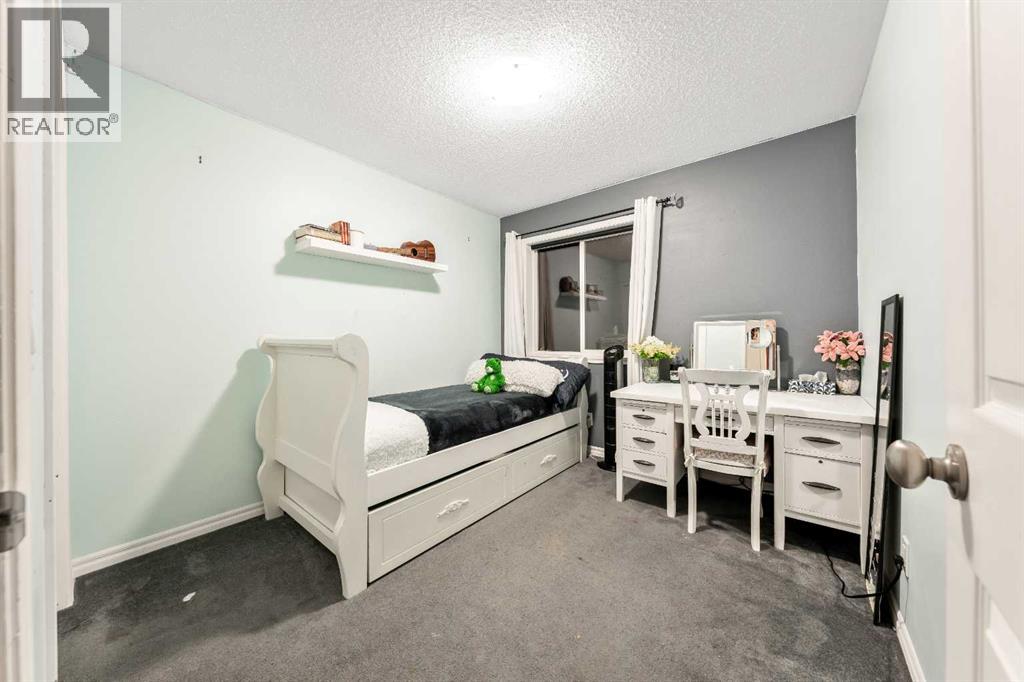 21 Mckinnon Street Nw, Langdon, Alberta  T0J 1X2 - Photo 28 - A2274079