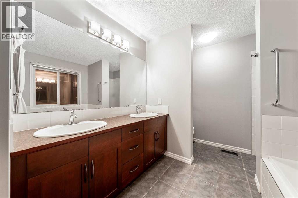 21 Mckinnon Street Nw, Langdon, Alberta  T0J 1X2 - Photo 22 - A2274079