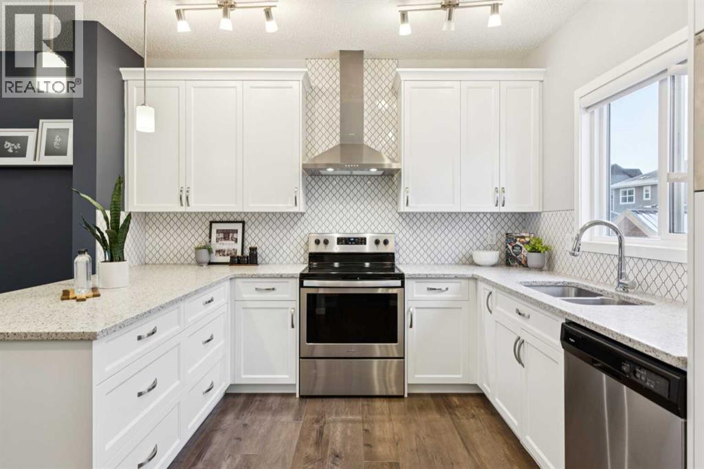 98 Magnolia Square Se, Calgary, Alberta  T3M 2W4 - Photo 12 - A2275585