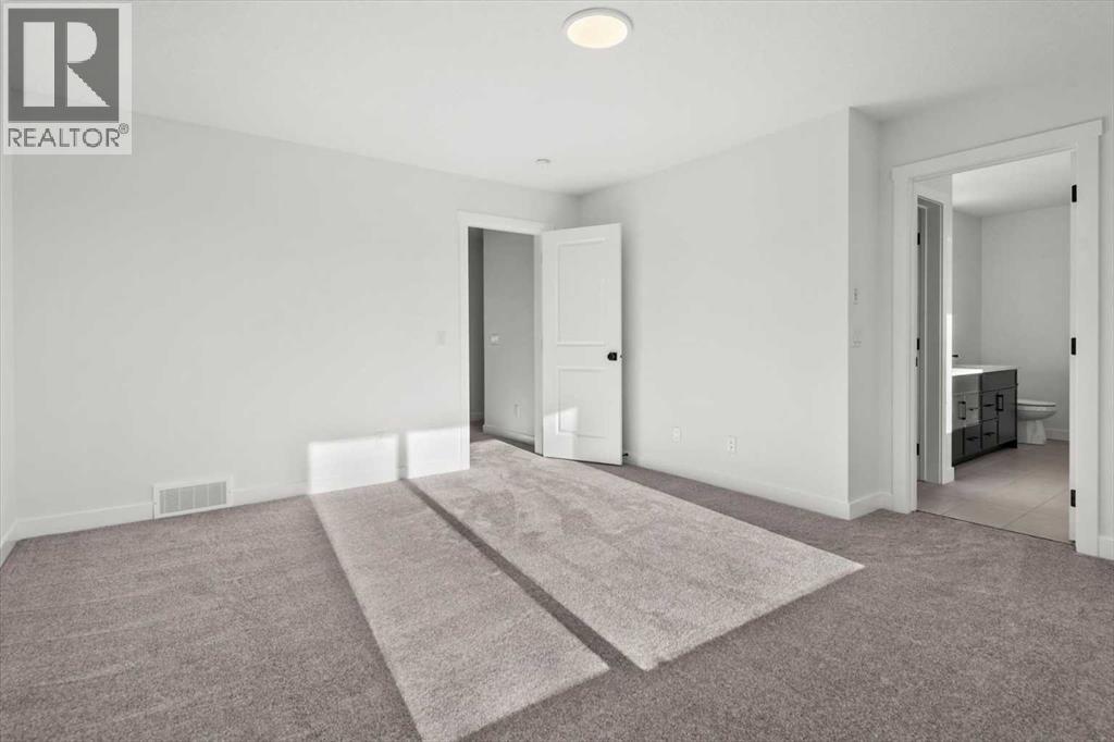 207 Perch Bend, Rural Rocky View County, Alberta  T3Z 0J9 - Photo 31 - A2263864