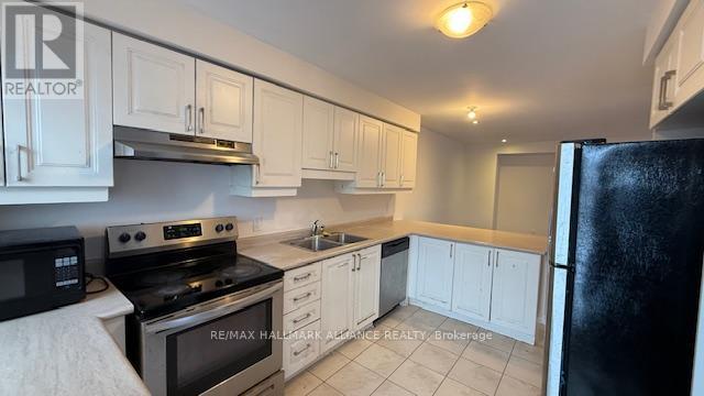 113 - 1000 Asleton Boulevard, Milton, Ontario  L9T 9L2 - Photo 6 - W12664710