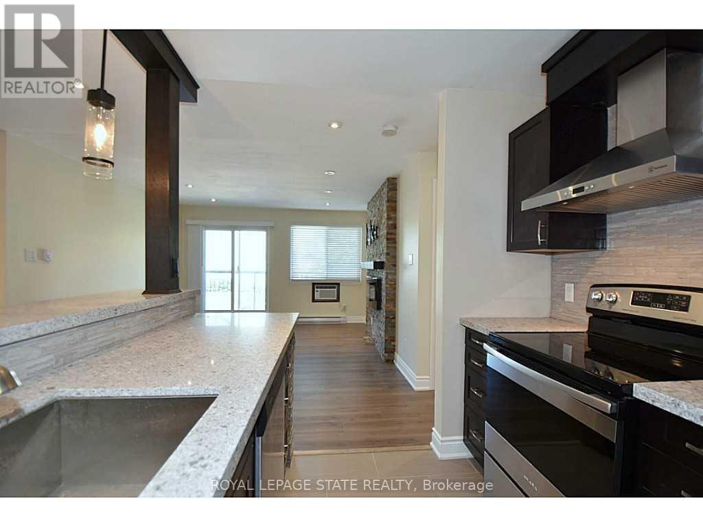 821 - 1450 Glen Abbey Gate, Oakville, Ontario  L6M 2V7 - Photo 6 - W12510896