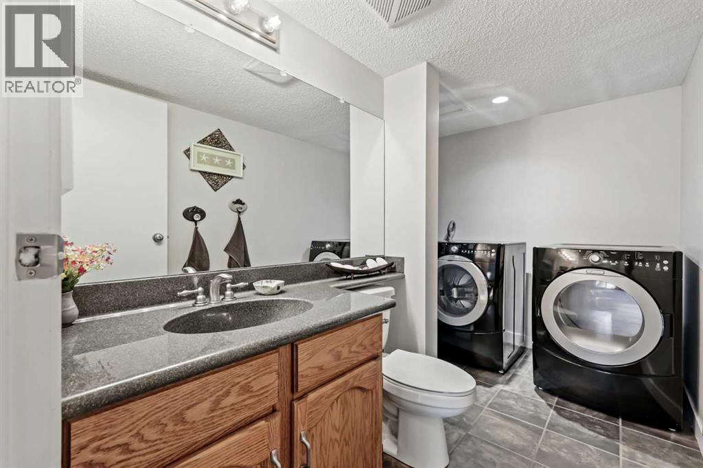 103 Sandarac Place Nw, Calgary, Alberta  T3K 2Y5 - Photo 23 - A2277271