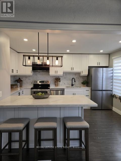 373 East 27th Street, Hamilton, Ontario  L8V 3H1 - Photo 4 - X12612604