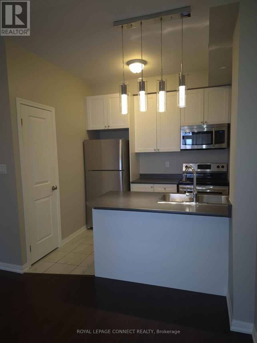 411 - 84 Aspen Springs Drive, Clarington, Ontario  L1C 0V3 - Photo 2 - E12639242