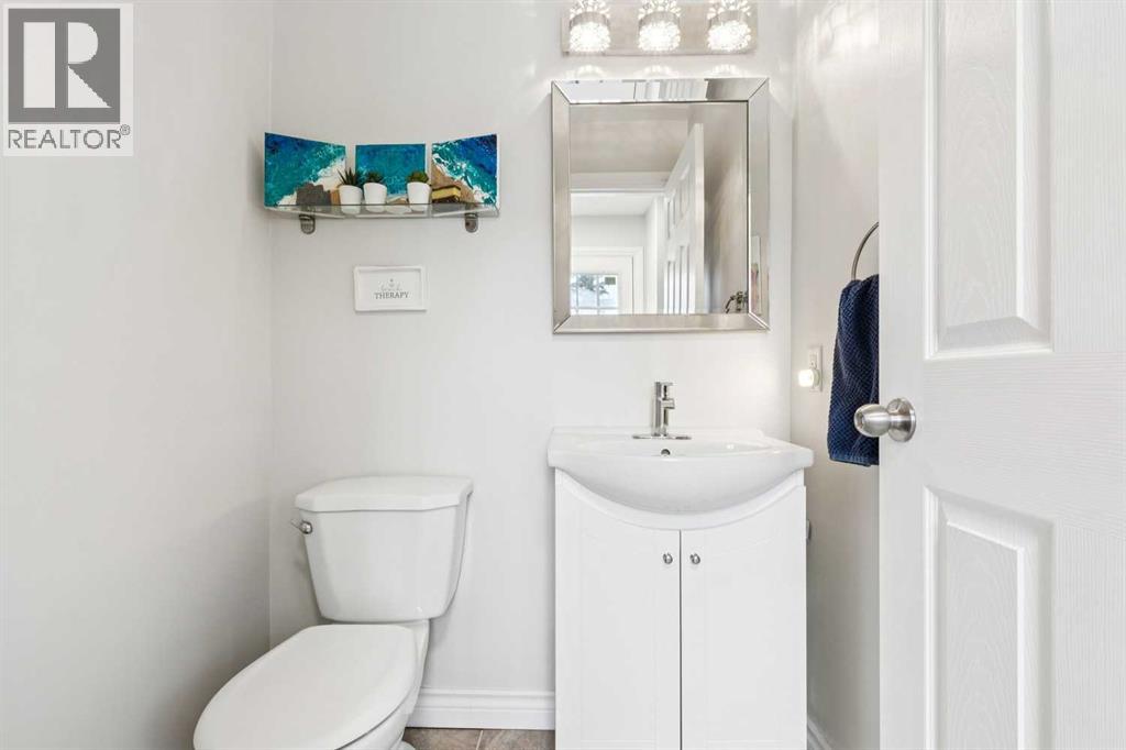 42 Cedarwood Hill Sw, Calgary, Alberta  T2W 3H5 - Photo 11 - A2276425