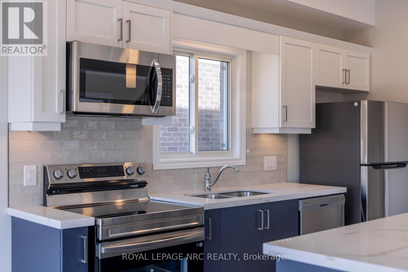 25 Mcmann Drive, Thorold, Ontario  L2V 2V5 - Photo 4 - X12668078