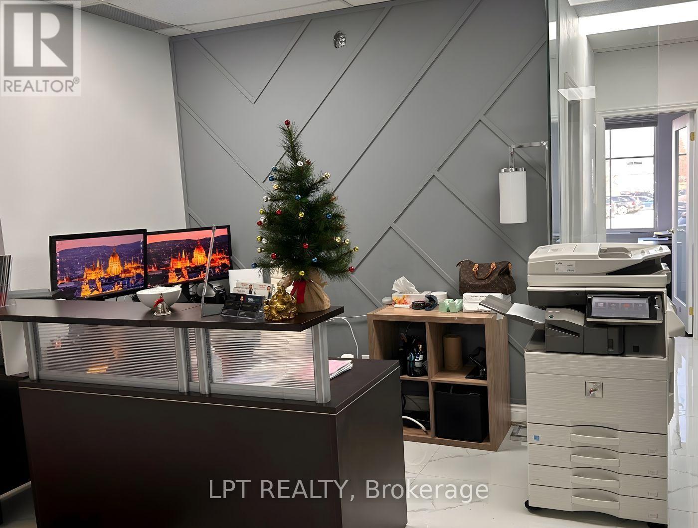 8-200 - 5045 Orbitor Drive, Mississauga, Ontario  L4W 4Y8 - Photo 2 - W12597866