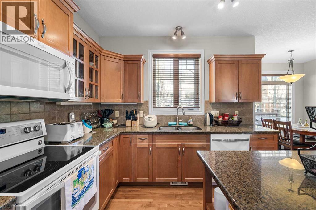 107 Panatella Close Nw, Calgary, Alberta  T3K 6C6 - Photo 10 - A2277383