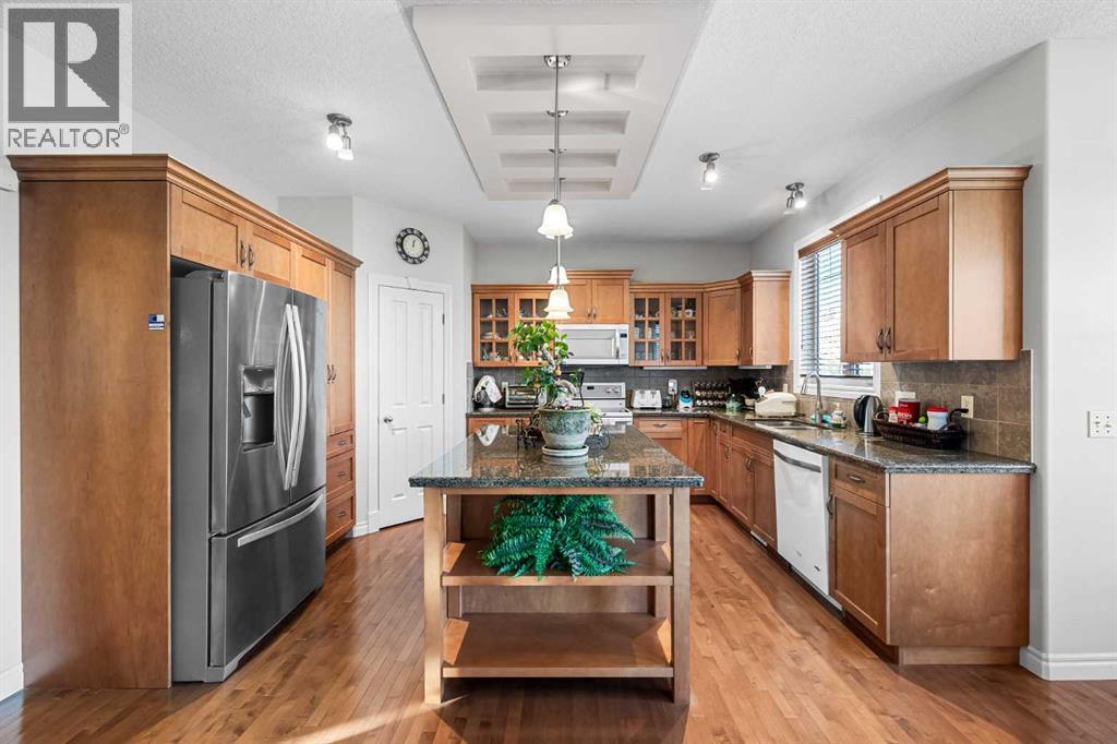 107 Panatella Close Nw, Calgary, Alberta  T3K 6C6 - Photo 9 - A2277383