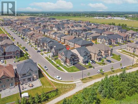 59 Cobriza Crescent, Brampton, Ontario  L7A 5A6 - Photo 7 - W12666300