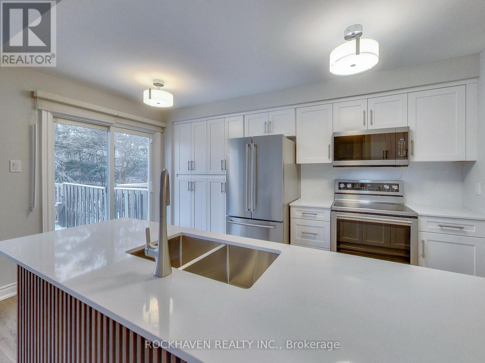 62 - 2350 Grand Ravine Drive, Oakville, Ontario  L6H 6E2 - Photo 7 - W12669054