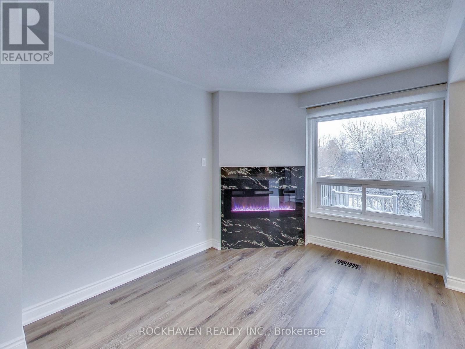 62 - 2350 Grand Ravine Drive, Oakville, Ontario  L6H 6E2 - Photo 9 - W12669054