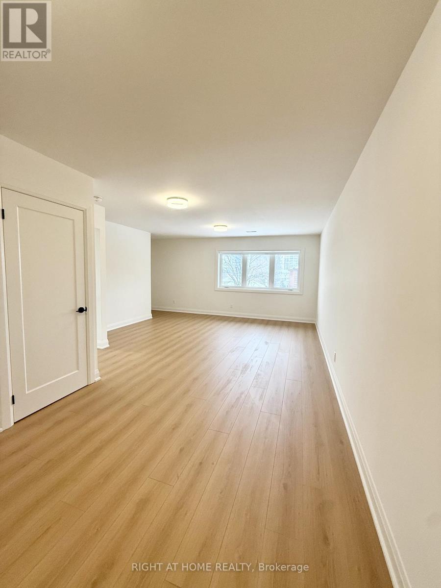 4 - 19 Arrowsmith Avenue, Toronto, Ontario  M6M 2W8 - Photo 5 - W12669164