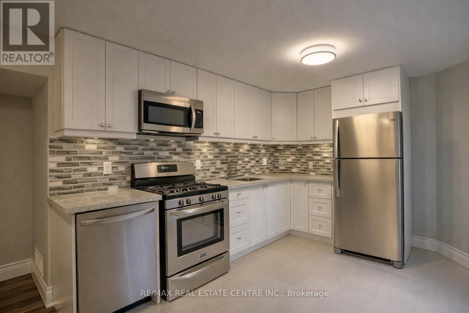 Basement - 230 Huntingford Gate, Milton, Ontario  L9T 0S4 - Photo 2 - W12669368