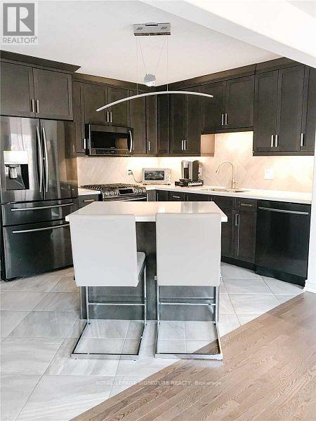 36 - 124 Parkinson Crescent, Orangeville, Ontario  L9W 3X6 - Photo 2 - W12669406