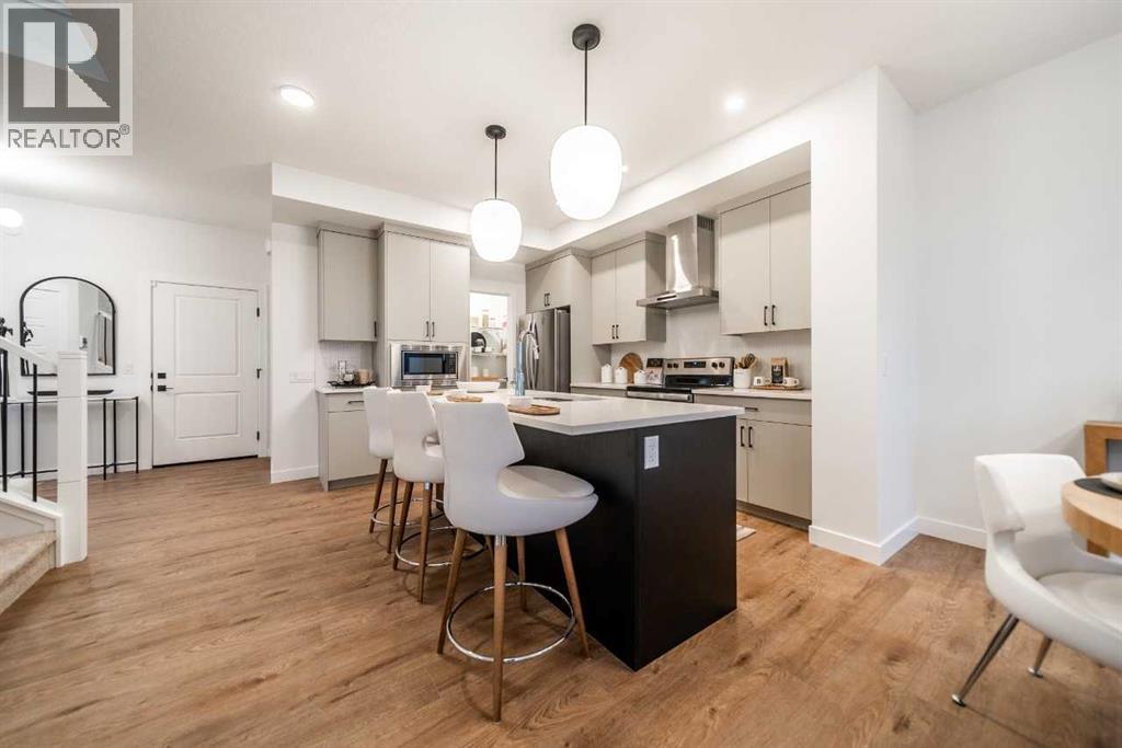 141 Southbow Drive, Cochrane, Alberta  T4C 3J9 - Photo 4 - A2257522