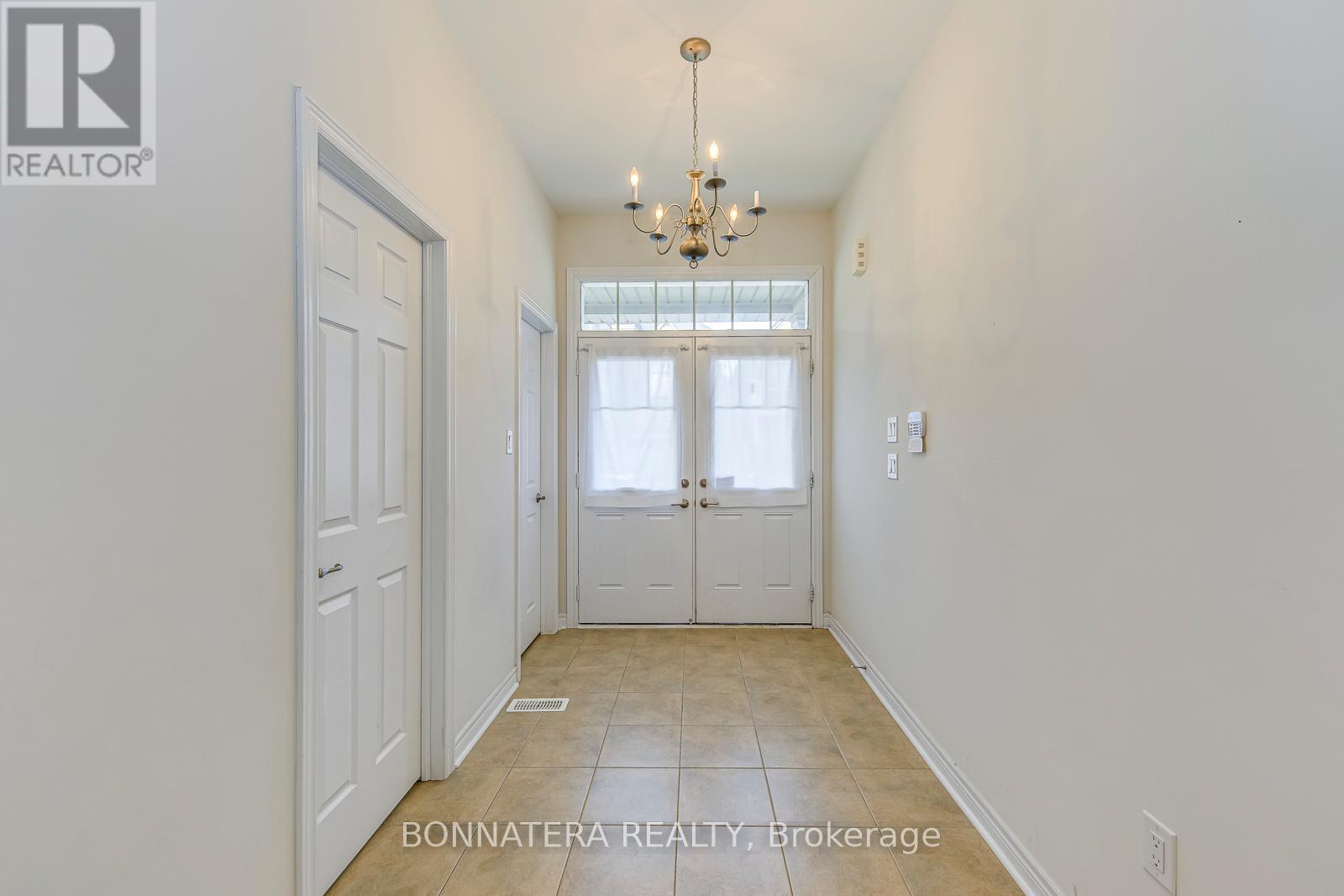 230 Jessie Caverhill Pass, Oakville, Ontario  L6M 0Z6 - Photo 4 - W12669574