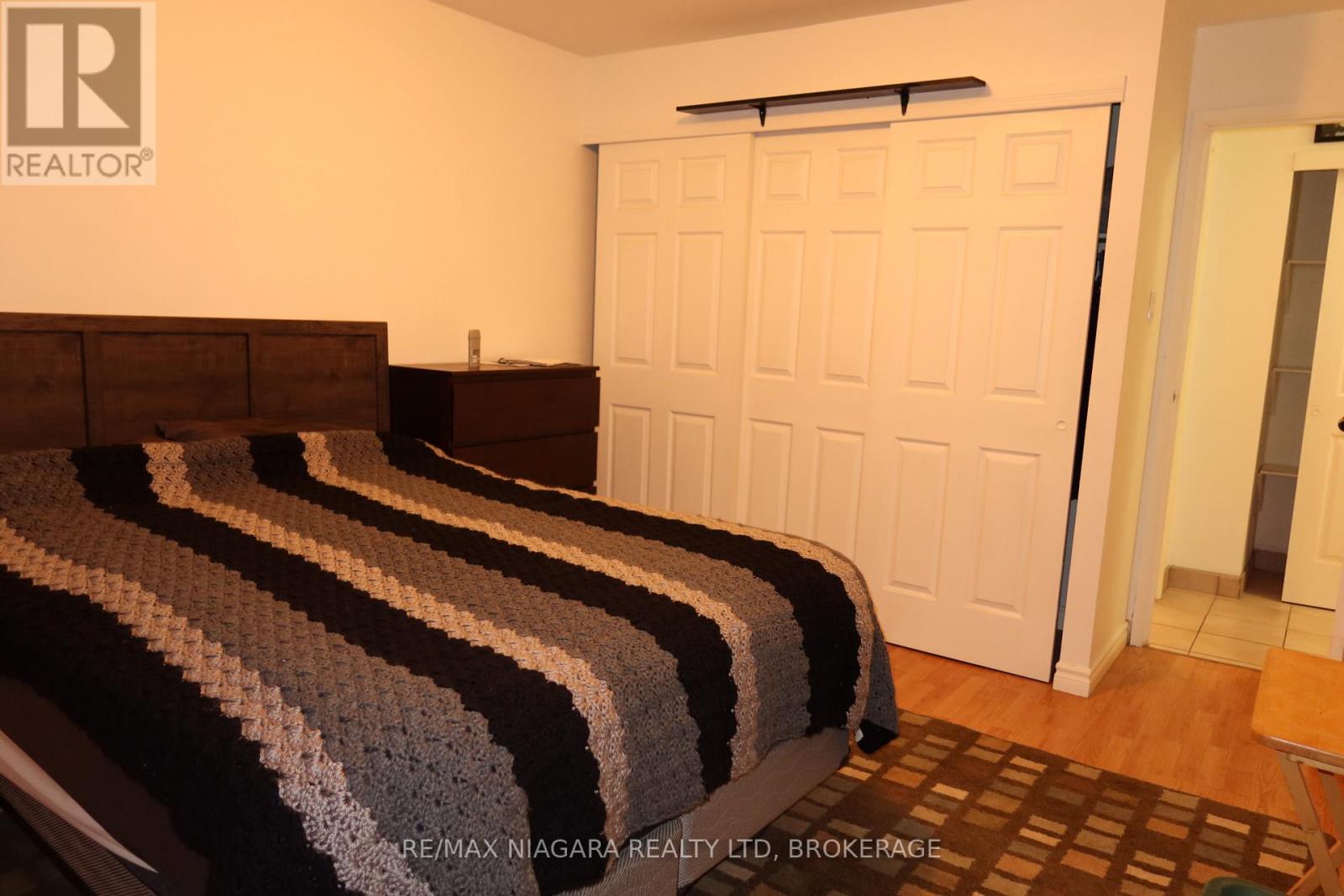 201 - 242 Oakdale Avenue, St. Catharines (Oakdale), Ontario  L2P 3K5 - Photo 8 - X12654266