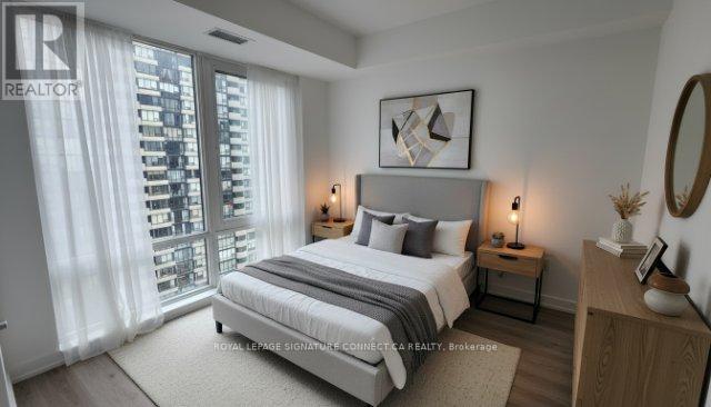 1009 - 395 Square One Drive, Mississauga, Ontario  L5B 0C6 - Photo 2 - W12669718