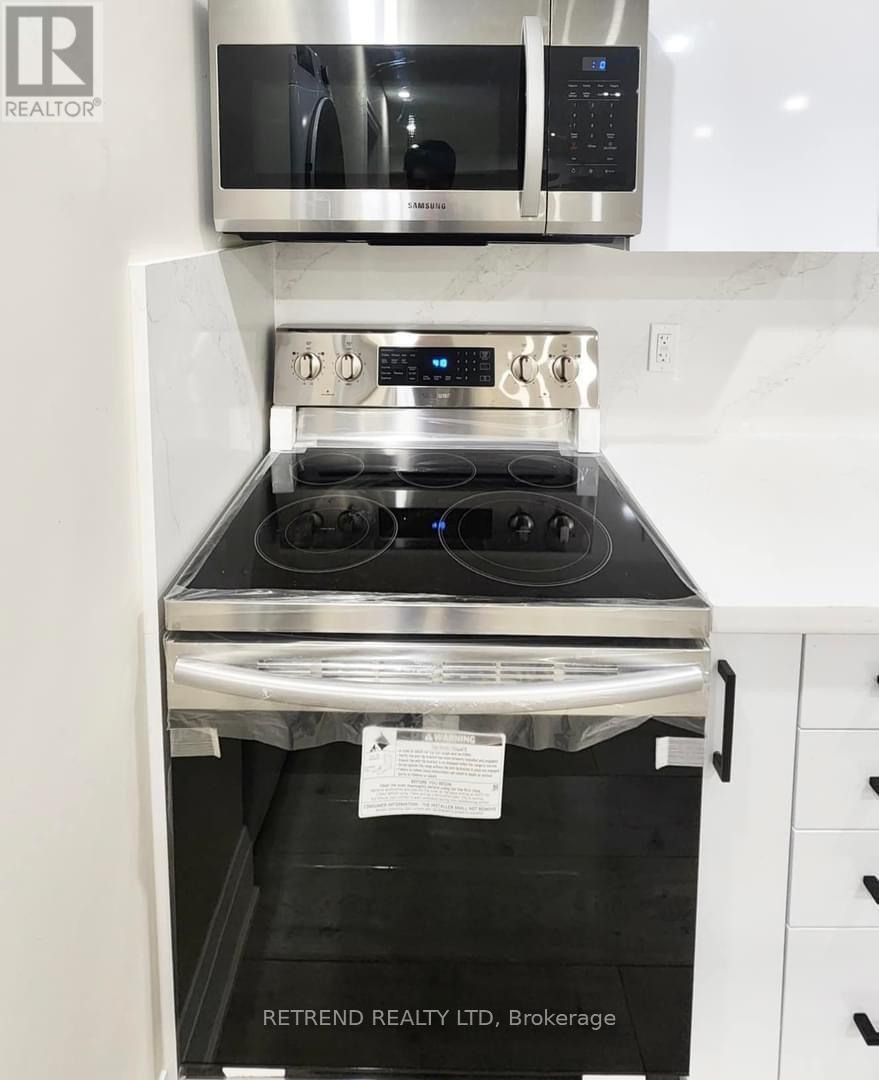 24 Howbert Drive, Toronto, Ontario  M9N 3L2 - Photo 4 - W12669752