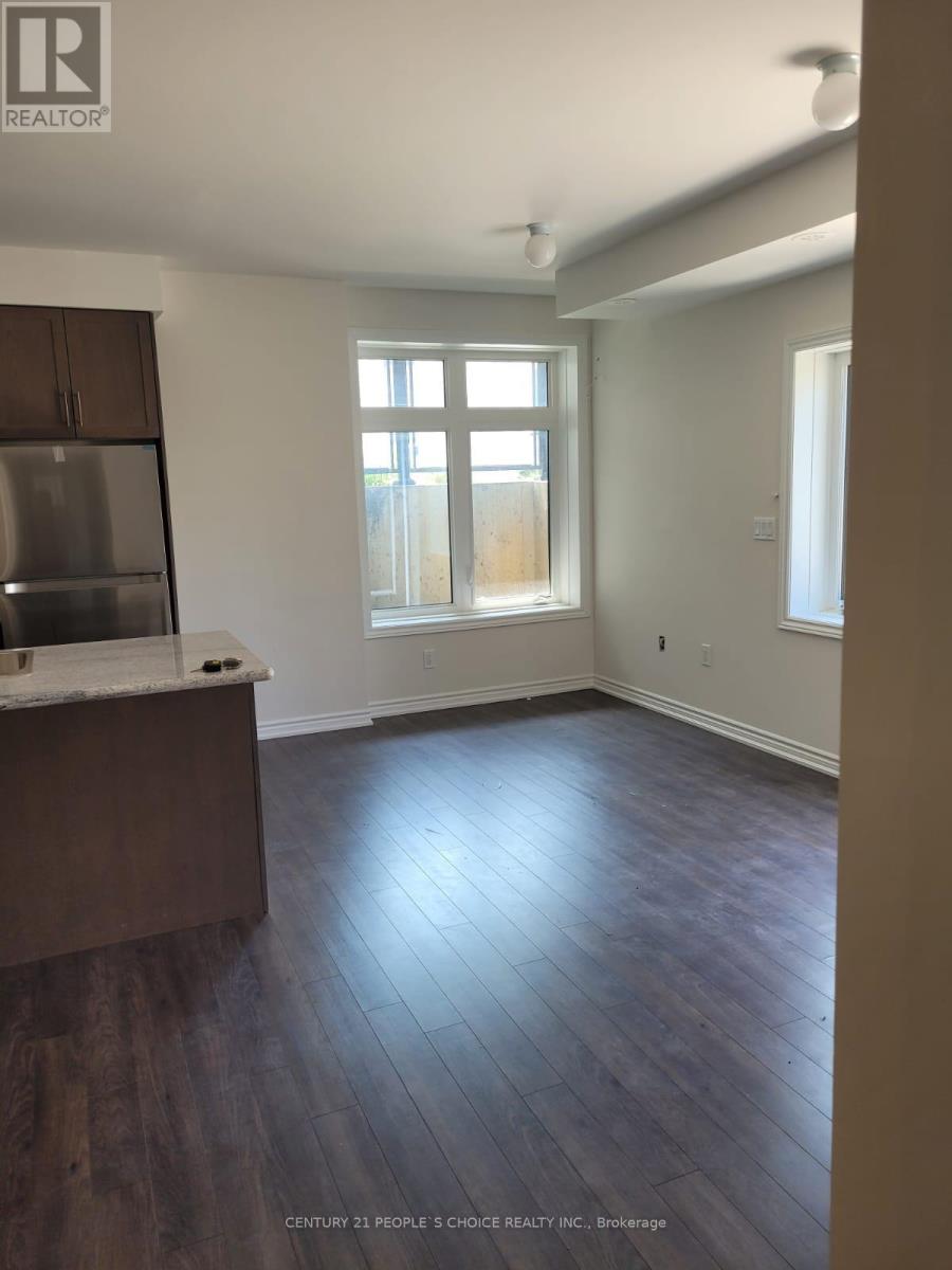 404 - 70 Halliford Place, Brampton, Ontario  L6P 4R1 - Photo 2 - W12670168