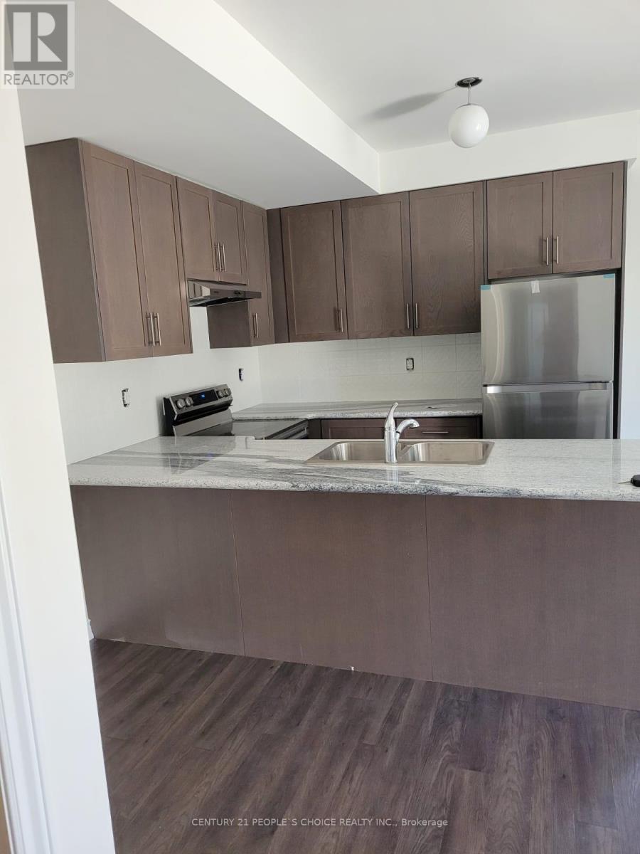 404 - 70 Halliford Place, Brampton, Ontario  L6P 4R1 - Photo 3 - W12670168