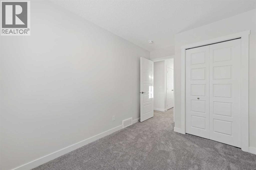 420 Fireside Drive, Cochrane, Alberta  T4C 3E1 - Photo 29 - A2275834