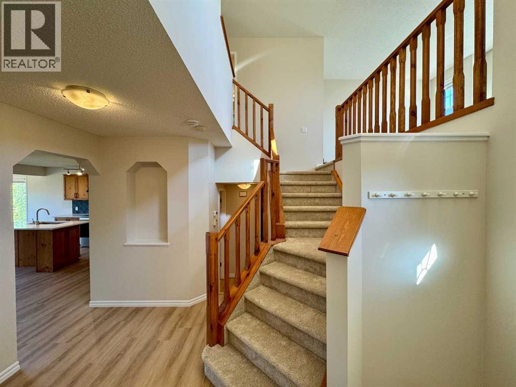 70 Glensummit Close, Cochrane, Alberta  T4C 2K1 - Photo 2 - A2264005