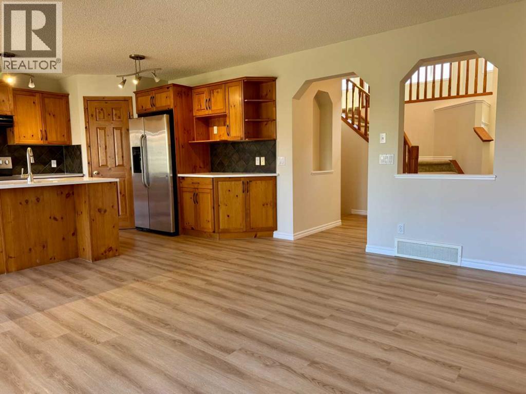 70 Glensummit Close, Cochrane, Alberta  T4C 2K1 - Photo 8 - A2264005