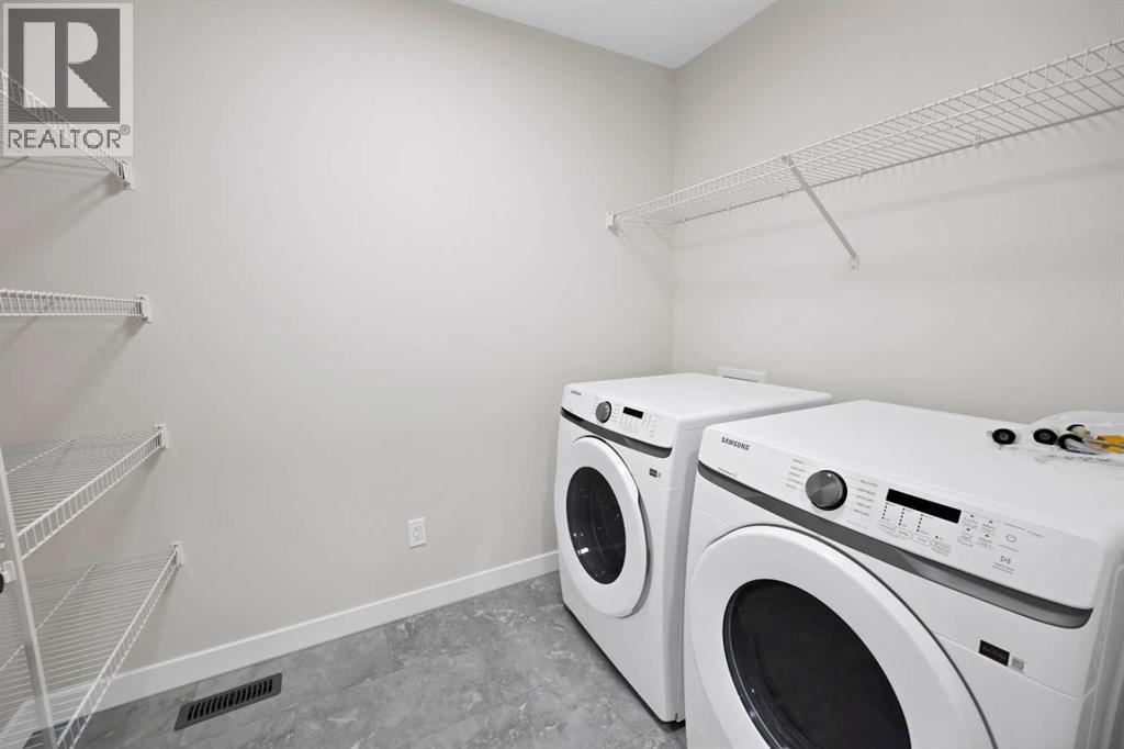 199 Homestead Common Ne, Calgary, Alberta  T3J 5V7 - Photo 32 - A2274932