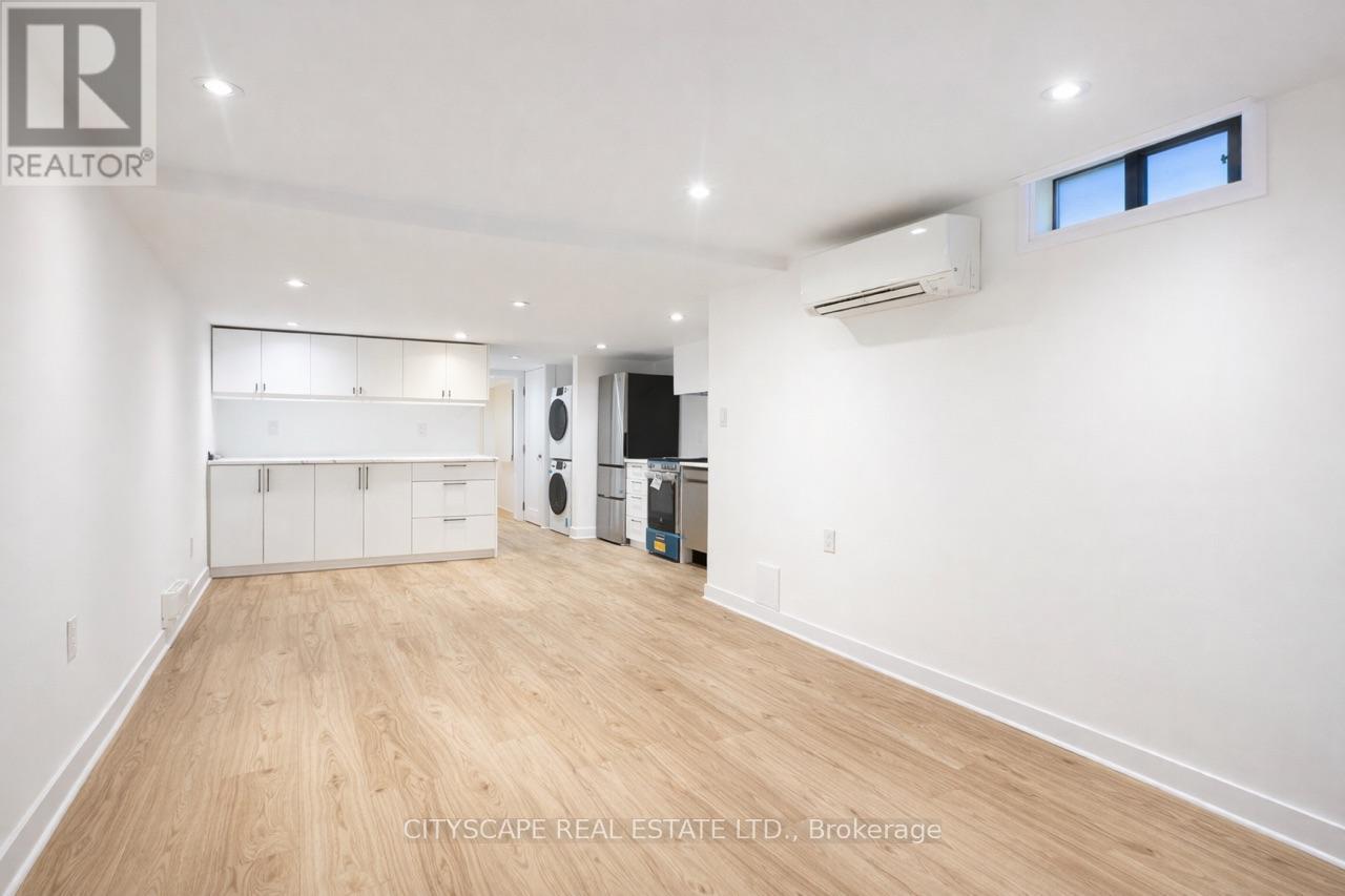 <div class="slider-price">$2,200 Monthly</div><p>211-B - 211 Shaw Street, Toronto, Ontario</p>